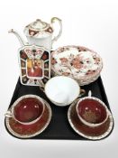 Two Shelley teacups and saucers on red ground, Royal Stafford sugar bowl,
