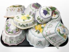 A group of eight Franklin Mint porcelain jelly moulds.