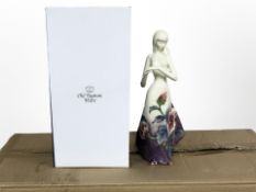 Eight matching Old Tupton Ware pottery figures of ladies in floral dresses, height 26cm, all boxed.