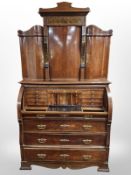 A 19th century Scandinavian oak and walnut cylinder front bureau bookcase,