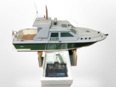 A remote-controlled scale model boat, length 83cm.