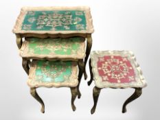 A nest of three gilt and painted tables,