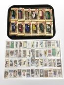 A group of boxed Lledo die-cast delivery vans and buses,