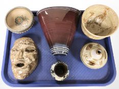 A John Maguire glazed ceramic wall pocket and five further pieces of studio pottery.
