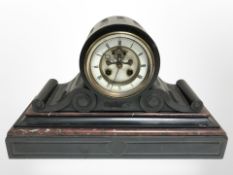 A Victorian black slate and rouge marble drum head mantle clock,