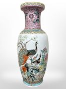 A large Chinese vase decorated with peacocks amongst foliage, height 59.