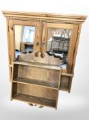 A mirrored pine double-door wall cabinet, height 73cm, and a further oak wall shelf.