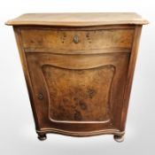 A 19th century continental burr walnut side cabinet,