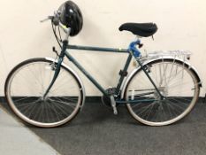 A Trek 700 Sport bike with helmet,