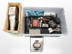A Gnome projector in box, together with a quantity of digital cameras, related camera equipment.