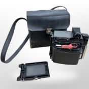 A vintage Graflex medium format camera.