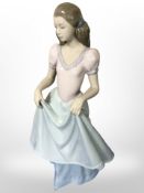 A large Nao figure of a lady in elegant dress, No. 1327, height 34cm.