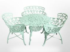 A painted cast iron garden patio table,