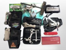 A Victorinox Swiss army officers knife in box, a further multi-tool knife and similar items.