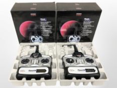 Two Planet T5 Advanced 2.4 GHz radio control hand sets, both boxed.