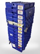 Twelve stackable plastic storage boxes with folding lids,