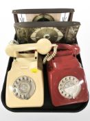 Two vintage plastic telephones and two Metamec brass-cased quartz mantel timepieces.