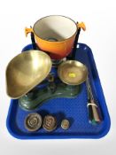 A Le Creuset enamelled cast-iron cooking pot on burner stand,