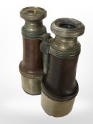 A pair of brass-mounted early-20th century military binoculars.