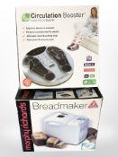 A boxed Morphy Richards breadmaker and a further circulation booster.