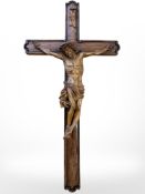 A Black Forest carved wooden crucifix, length 43cm.