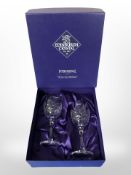 A boxed pair of Edinburgh Crystal International wine glasses, height 17cm.
