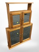 Two contemporary pine mirrored wall cabinets,