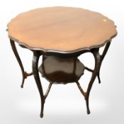 An Edwardian mahogany two-tier scalloped edge occasional table,