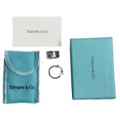 A pair of Tiffany Sterling silver heavy gauge hoop earrings, with original receipt dated 9.12.