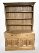A Victorian style pine dresser, 136cm w x 43cm d x 203cm h.