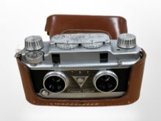 A TDC Bell & Howell stereo vivid camera.
