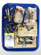 A group of mainly American coins, foreign bank notes, pocket knives, clock winding keys, ephemera,