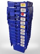 Twelve stackable plastic storage boxes with folding lids,