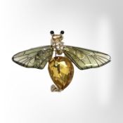 A gilded lucite insect brooch