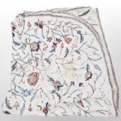 An embroidered throw
