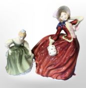 A Royal Doulton figure, 'Autumn Breezes', HN 1934, and 'Fair Maiden', HN 2211.