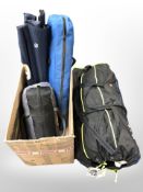 An Outwell inflatable awning, together with a tent and two folding camp beds.