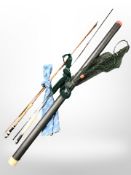 A Daiwa two-piece fishing rod, a Bob Church two-piece rod, a landing net,
