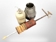 A vintage Star vacuum cleaner, a stone ware water purifier, and an aluminium churn.