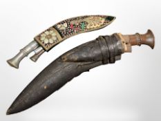 A kukri knife with 32cm blade, in sheath,