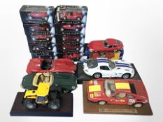 A group of boxed and unboxed die-cast scale model cars including Corgi, Bburago, etc.