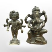 A 19th century Indian brass figure of a Ganesh, and a further temple deity, tallest 7cm.