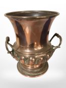 A 19th-century copper planter in the form of an urn, height 21cm.