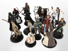 A group of Disney Star Wars figurines, tallest 10.5cm.