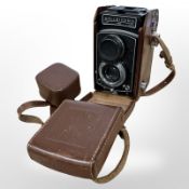 A Rolleicord medium format TLR camera with a Schneider-Kreuznach Xenar 1:3,5/75 lens.