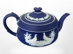 A Wedgwood blue and white Jasperware teapot, height 12cm.