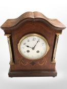 An Edwardian inlaid mahogany eight-day mantel clock, height 27cm.