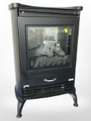 An electric heater in the form of a fire.