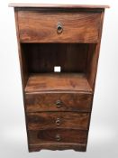 A contemporary hardwood four drawer open shelf,