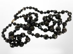 A double-strand faceted agate necklace.